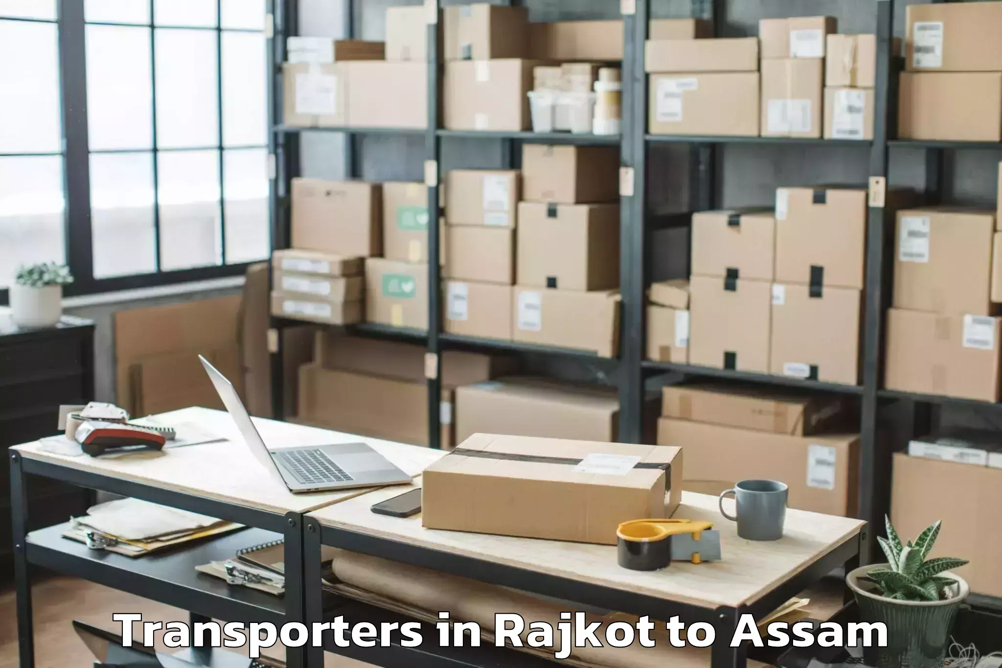 Book Rajkot to Sonai Transporters Online